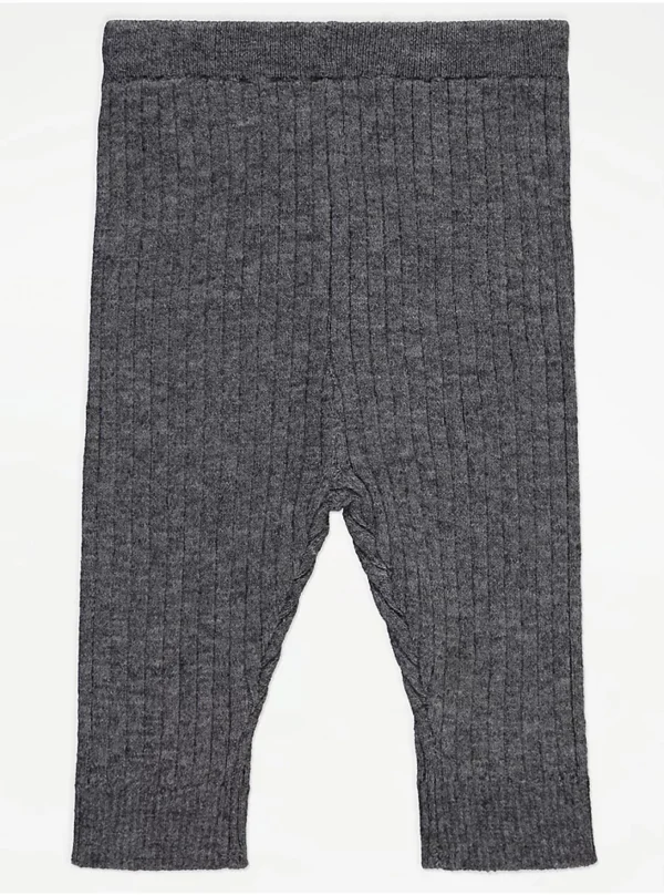 Set me bluzë me arush, jelek dhe pantallona të rifluara