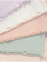 Set me 5 triko në ngjyra pastel me material ribbed dhe fund valëzuar