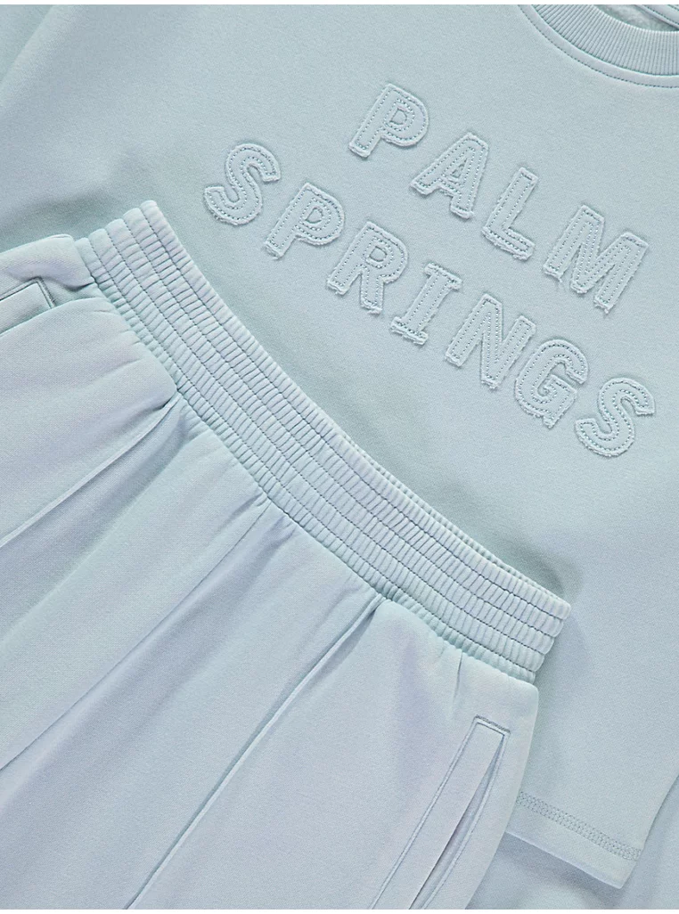 Veshje “Palm Springs” blu — sweatshirt dhe joggers